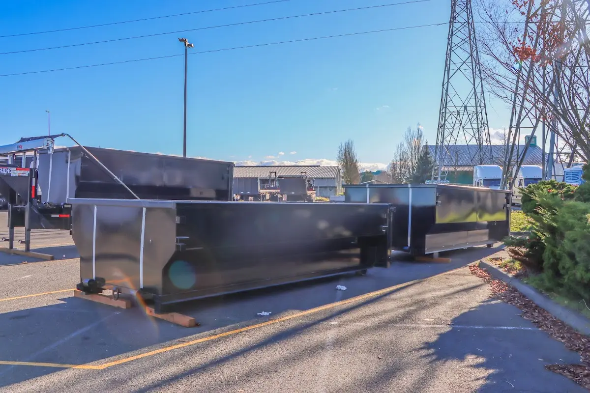 Roll-off dumpster ready for waste disposal at job site for Yard Waste Dumpster Rental in Kirkwood